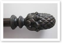 Custom iron finial, Catalog number 117, Length 3 1/2in. Height 2in.